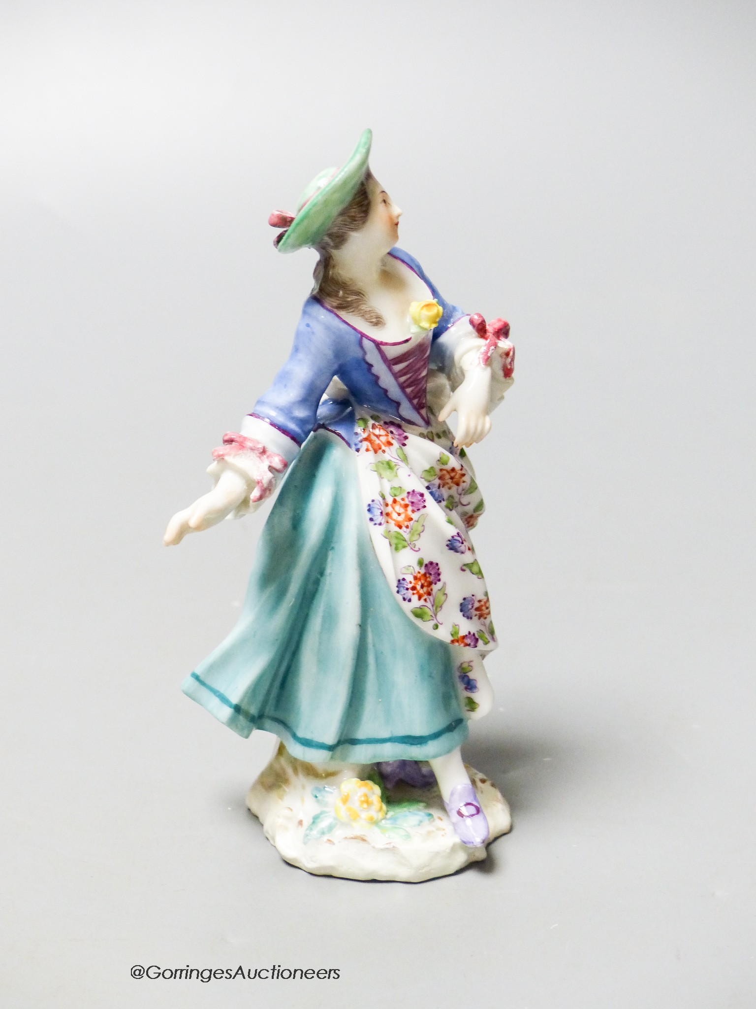 A Meissen figure of a dancing lady, 18th/19th century, height 13cm